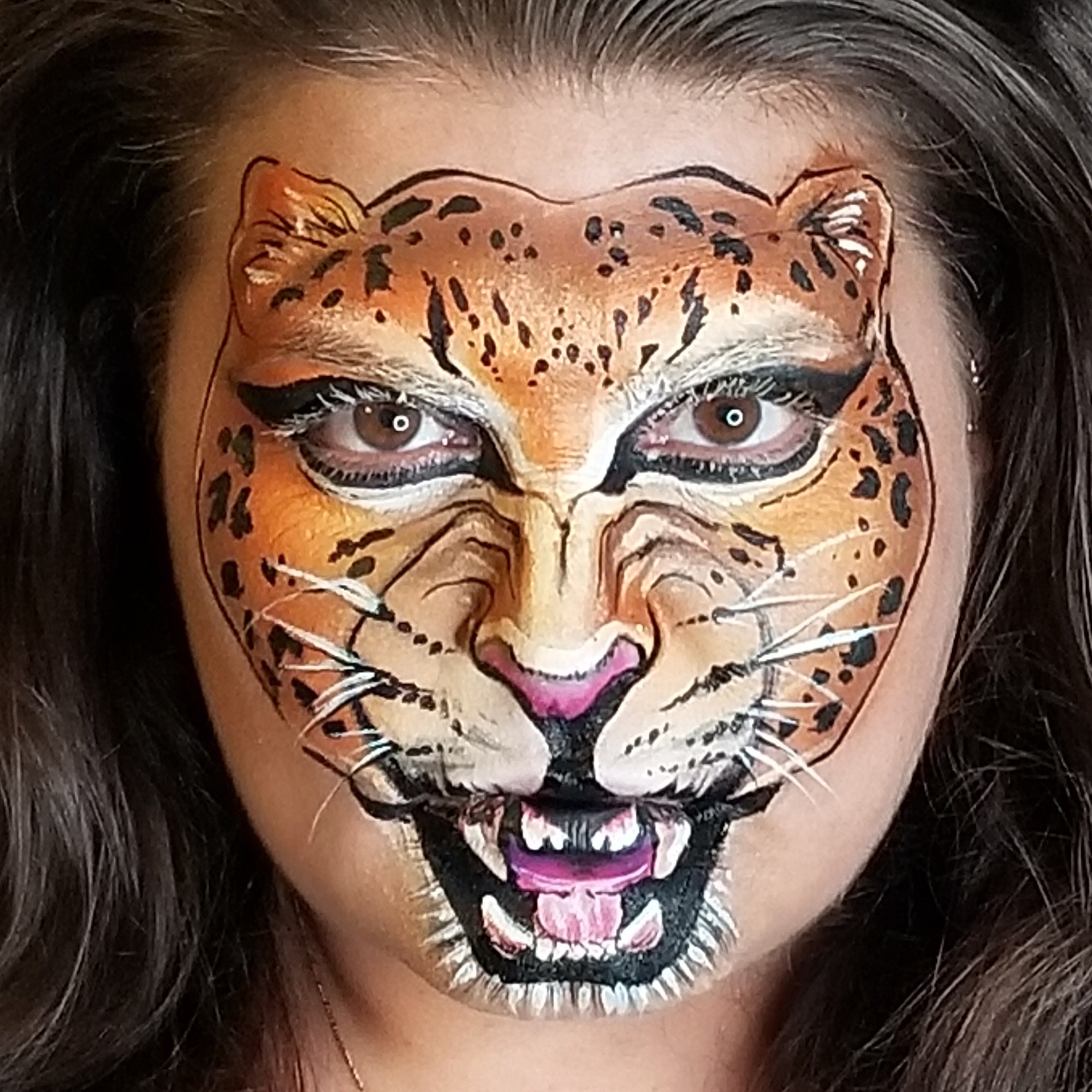 Roaring Cheetah Face Paint Design by Kellie Burrus