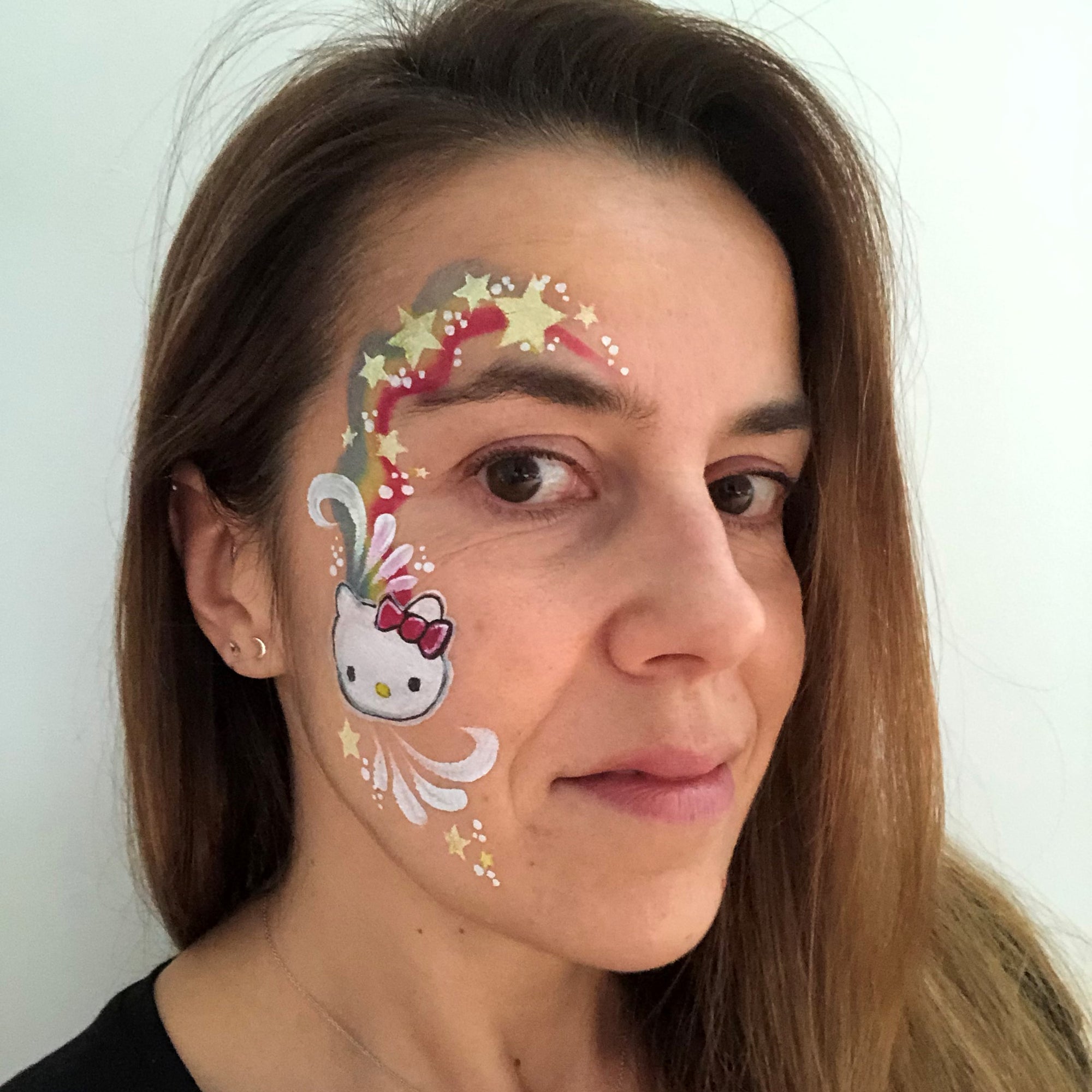 Hello Kitty Face Paint Design by Belén